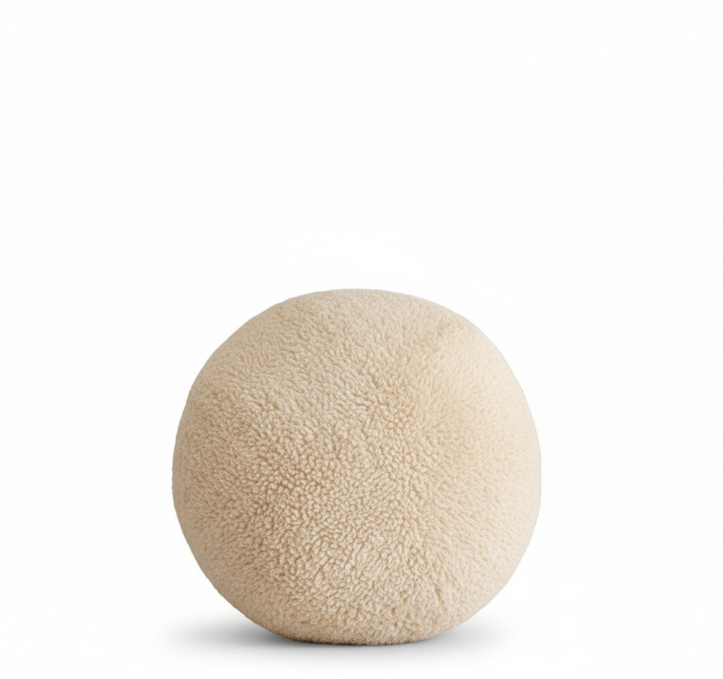 Coussin rond en laine bouclée