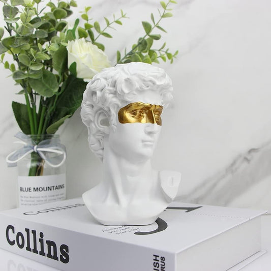 Déco à poser résine David yeux dorés