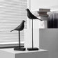 Oiseau sur socle - design minimaliste