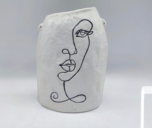 Vase visage minimaliste