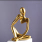 Figurines penseurs