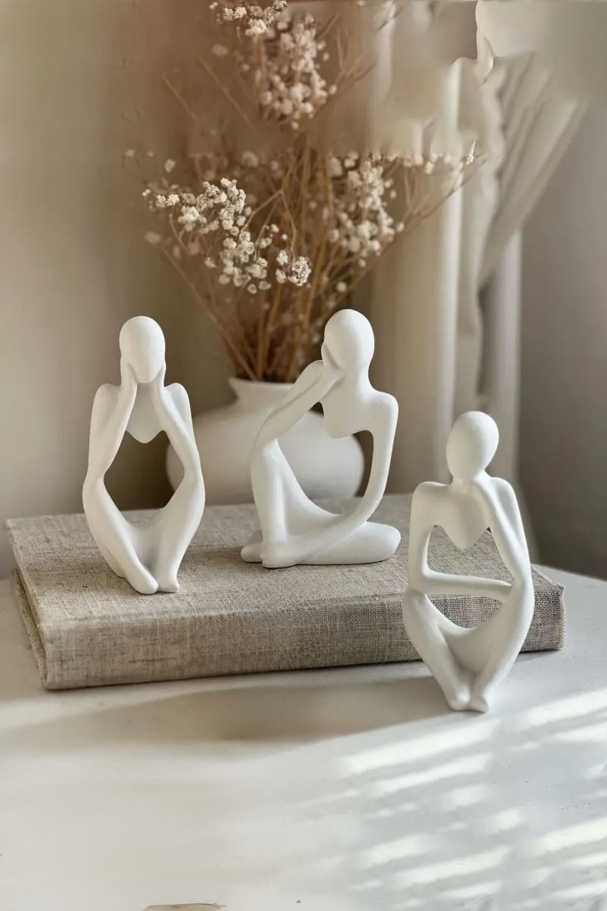Figurines penseurs