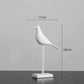 Oiseau sur socle - design minimaliste