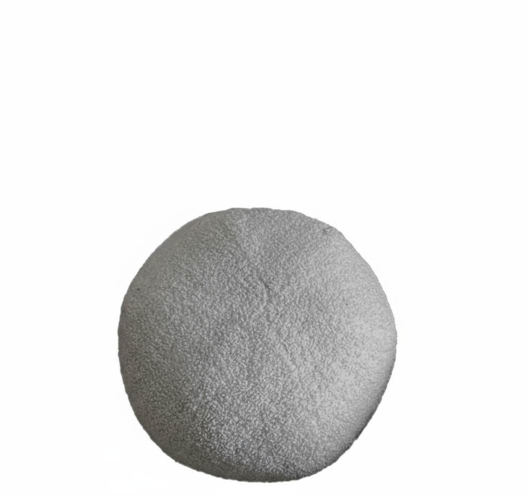 Coussin rond en laine bouclée