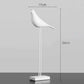 Oiseau sur socle - design minimaliste